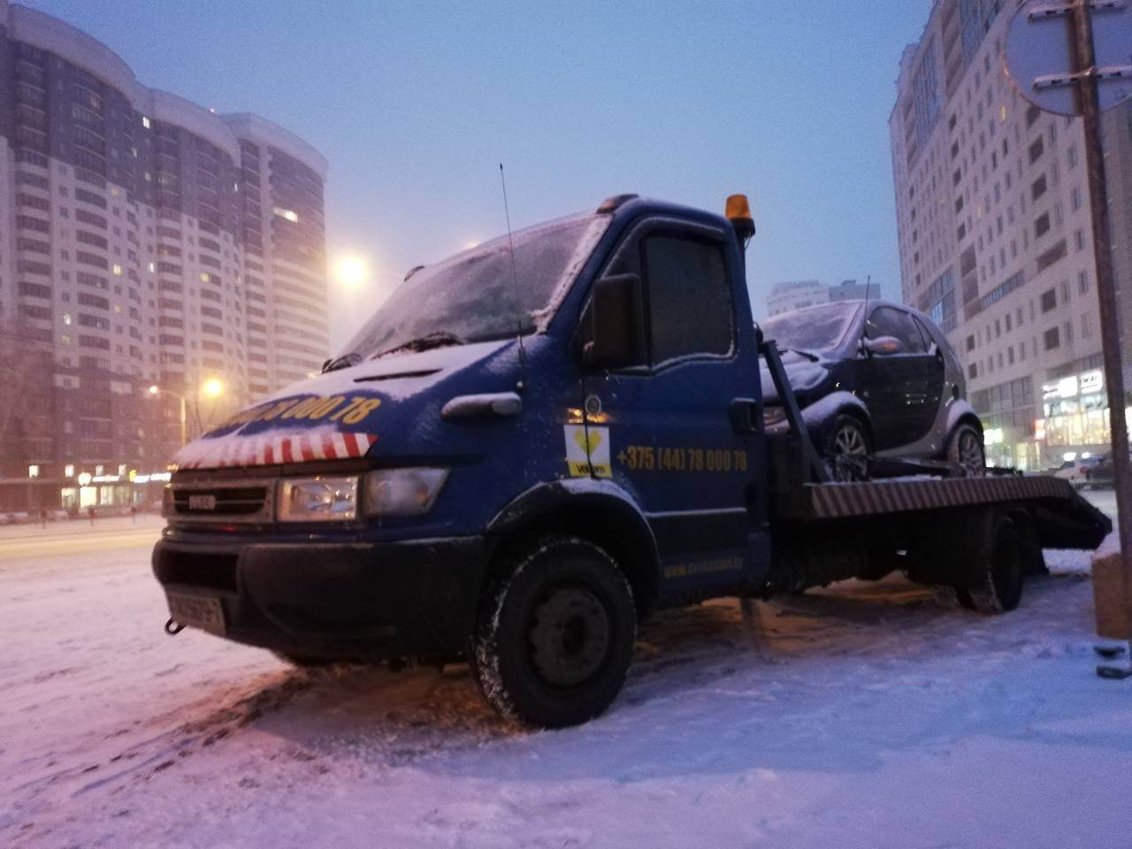 Эвакуатор для легкового авто зимой